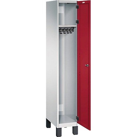 Weißer Schrank mit roter Tür. Tür geöffnet, Hakenleiste im Inneren.