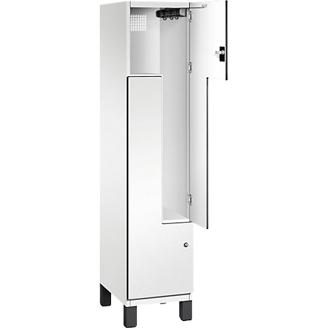 Weißer Schrank, Tür geöffnet, schwarze Details, offenes Fach.