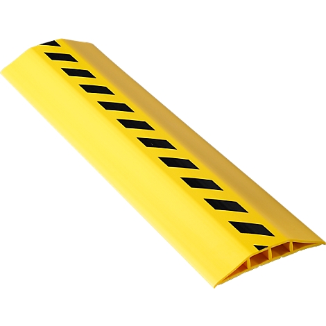 Yellow cable bridge with black and yellow warning markings. Two channels for laying cables.