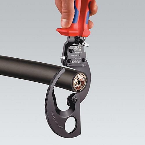 Hand holding cable cutter. The cutter surrounds a black cable, whose interior is exposed with copper conductors.