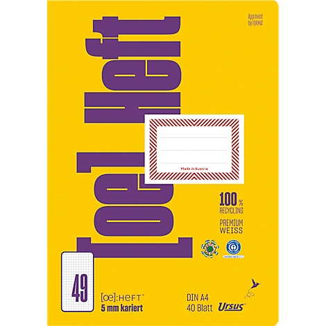 Cahier jaune avec lettrage violet 'Heft', champ d'adresse rouge et impressions.