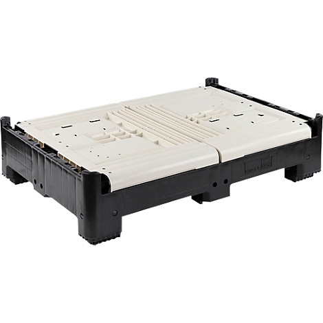 Palette en plastique noir et beige, vue de dessus. La palette est partiellement repliée.