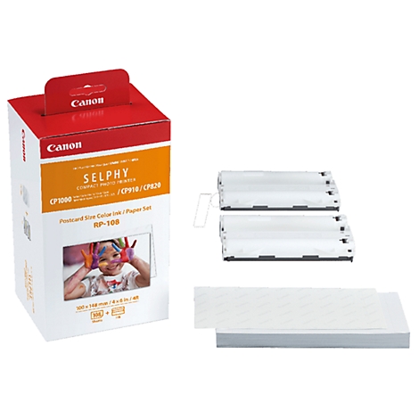 Produktverpackung mit Druckerpapier und Tintenpatronen. Das Etikett zeigt das Canon SELPHY-Logo und ein Kind mit bemalten Händen.