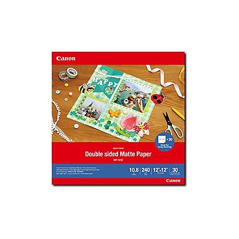 Verpackung von Canon beidseitig mattem Fotopapier mit Bastelprojekt auf Holzoberfläche.