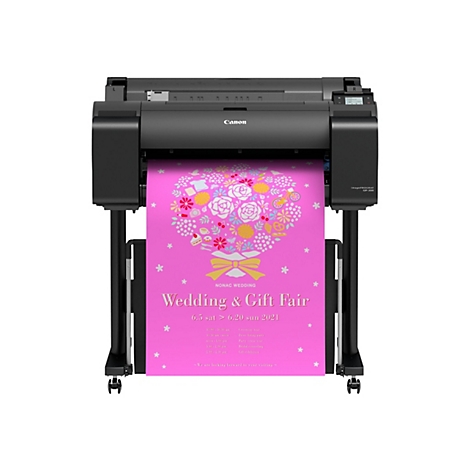 Eine Canon Großformatdruckmaschine, die einen rosa Banner mit einem Hochzeits- und Geschenke-Messe-Motiv druckt.