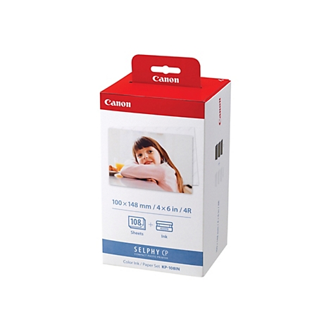 Weiße Verpackung für Canon Selphy Fotopapier und Tinte mit Bild eines lächelnden Mädchens.