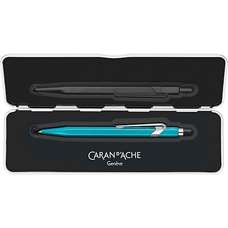 Opened pen case with a black and a teal pen. The Caran d'Ache logo is visible.