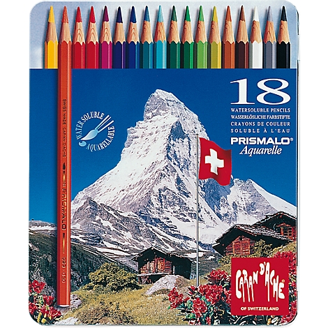 Colored pencils in a box with a Swiss mountain scene. A pencil says "Water soluble".