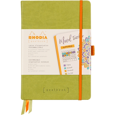Cahier vert avec élastique orange et suivi d'humeur imprimé. "Rhodia Goalbook" est imprimé sur la couverture.
