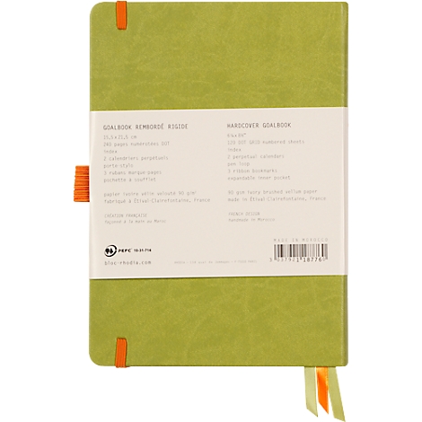 Cahier vert avec des marqueurs orange, affichant le texte "GOALBOOK RIMBORSE RIGIDE".