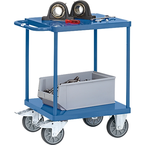 Carro de herramientas azul con rodamientos, herramientas y cajón. Ruedas debajo del carro.