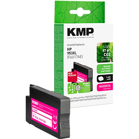 Une cartouche d'encre noire KMP avec une couleur magenta devant l'emballage du produit. Emballage avec des accents verts et des désignations de produits.