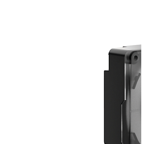 Gros plan d'un boîtier rectangulaire noir aux bords arrondis. Un panneau transparent se trouve sur le côté droit.