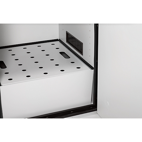 Intérieur blanc avec insert perforé et cadre noir.