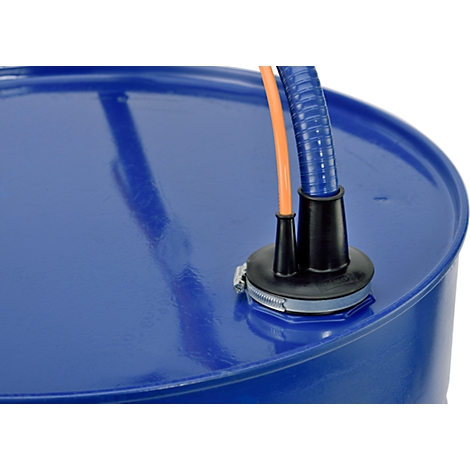 Close-up of a blue barrel with hose and pipe connections.