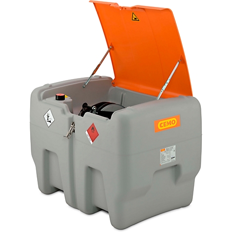Grey diesel tank with open orange lid. Warning signs and company logo are visible.