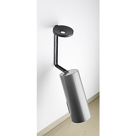 Une lampe murale en métal, avec un abat-jour cylindrique et un support mural noir et rond.