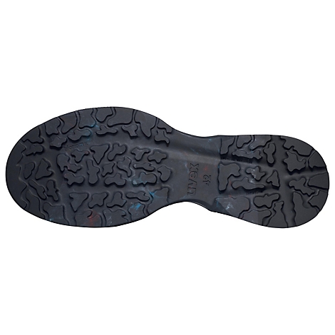 Semelle de chaussure noire avec motif de bande de roulement. Marque Uvex, taille 42. Éclaboussures de peinture sur la semelle.
