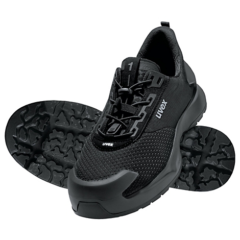 Chaussure de sécurité noire Uvex; lacets, semelle et embout visibles.