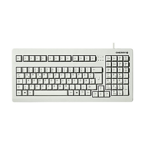 Clavier Cherry gris clair avec touches blanches et lettrage noir. Les lettres sont disposées au milieu, touches de fonction en haut.