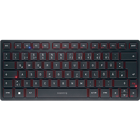 Clavier sombre avec rétro-éclairage rouge. Lettres et symboles en caractères blancs.