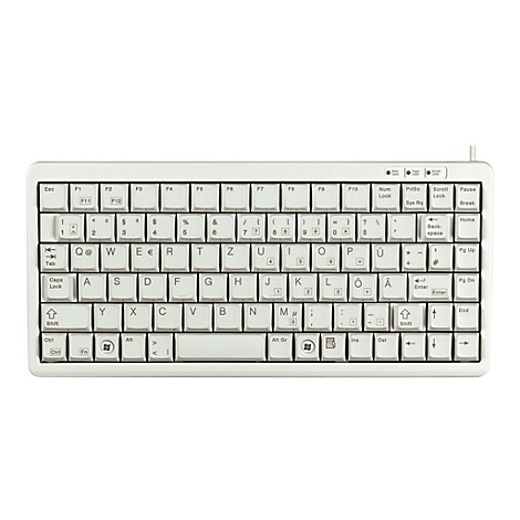 Kompakte, weiße Tastatur mit schwarzen Beschriftungen. Buchstaben, Zahlen und Sonderzeichen sind auf den Tasten erkennbar. Oben befinden sich Funktionstasten und Kontrollleuchten.