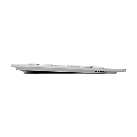 Hellgraue Tastatur im Seitenprofil. Oben sind die Tasten zu sehen, unten die Unterseite mit kleinen Öffnungen.