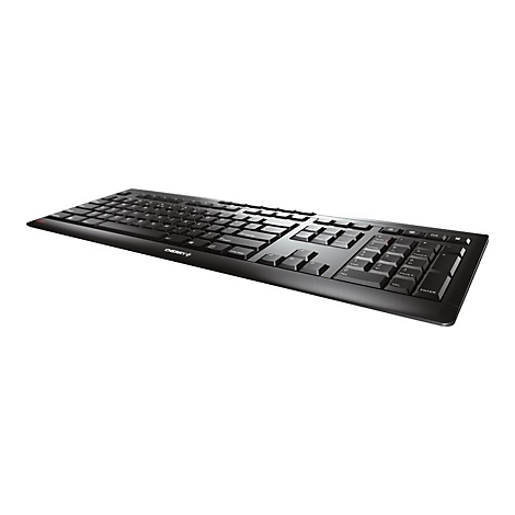 Schwarze Computer-Tastatur im Detail, diagonal von links unten nach rechts oben fotografiert.