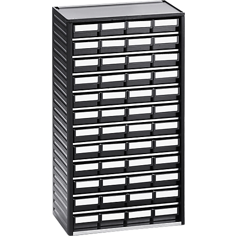 Black cabinet with many drawers, each with a white label. The drawers are arranged in rows.