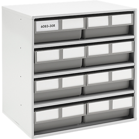 A white storage system with drawers. "6083-30R" is written on the top left. The drawers are grey with white labels.