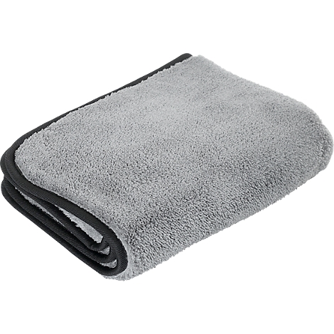 Serviette en microfibre grise avec bord noir, pliée.