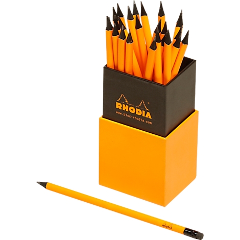 Yellow pencils with black tips in a black container and a yellow container below. One pencil is in front.