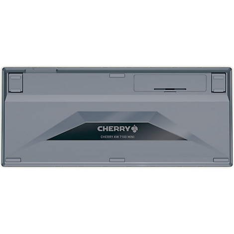 Fond gris du clavier, logo central et lettrage Cherry. Sur la droite se trouve un renfoncement avec une fente.