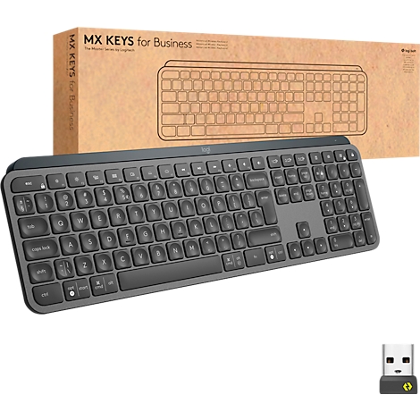 Vue de dessus d'un clavier sombre avec un emballage marron. L'emballage indique "MX KEYS for Business".