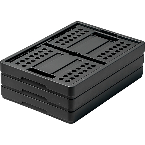 Three black, flat, rectangular boxes stacked. The surfaces are perforated with small holes.