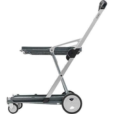 Grey shopping trolley in profile, with handle, two large wheels, two small wheels and shelf.