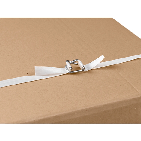 Close-up of a cardboard box corner sealed with white tape and metal clamp. The tape is stretched around the box.