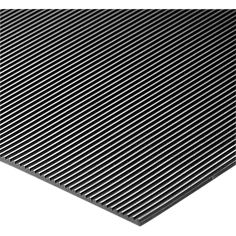 Close-up of a black, ribbed mat with parallel diagonal grooves.
