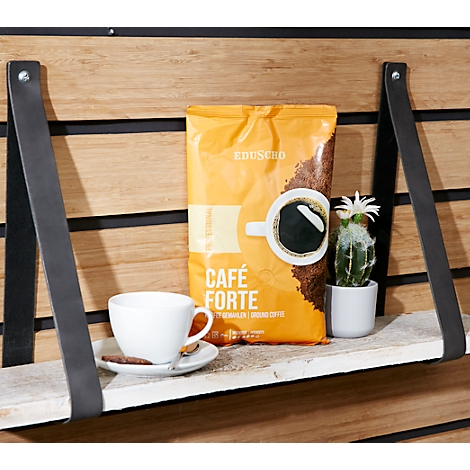 A coffee cup, a bag of coffee and a cactus on a shelf.