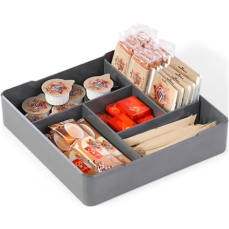 Grey storage box with coffee and tea accessories: creamer, sugar, cookies, tea bags, coffee sticks.