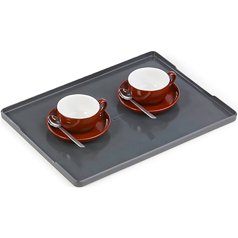 Two cups of coffee on brown saucers, with spoons, are on a grey tray.