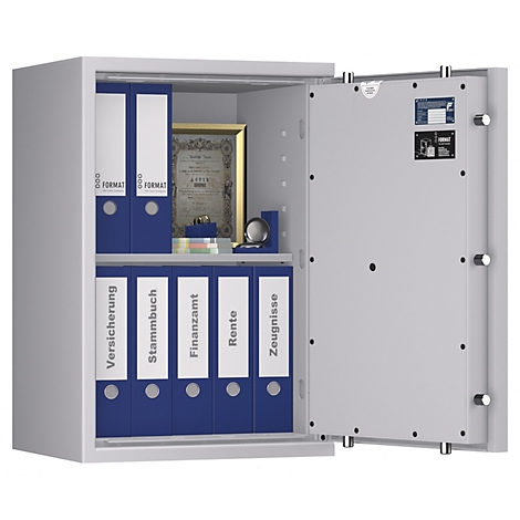 Un coffre-fort blanc ouvert rempli de dossiers bleus. Certains dossiers sont étiquetés 'Versicherung', 'Stammbuch', 'Finanzamt', 'Rente' et 'Zeugnisse'.