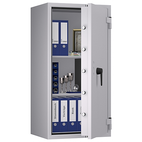 Coffre-fort gris, entrouvert, avec des dossiers et de la verrerie à l'intérieur.