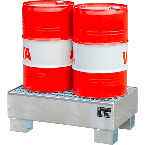 Two red barrels with white lettering on a metal drip tray.