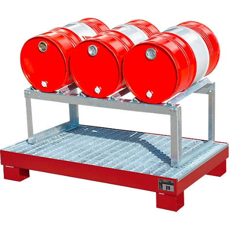 Red barrels on metal construction. The barrels rest on a metal shelf. Below is a metal tray and red painted feet.