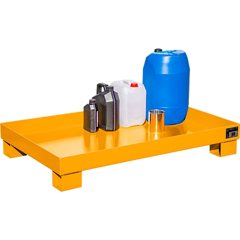 Yellow spill containment pallet with different containers.