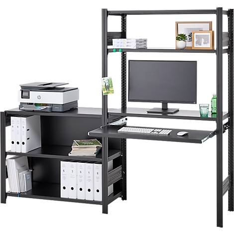 Bureau de bureau noir avec imprimante, moniteur et dossiers. Un verre, une plante et une image sont également sur la table.