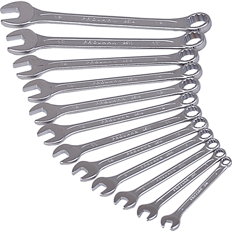 Set of chrome wrenches on a white background. The wrenches are of different sizes and marked with markings.