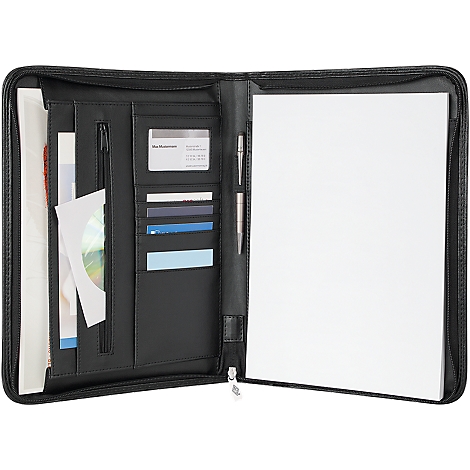 Opened black leather folder with documents and card slots on the left, paper on the right. Pen and zipper visible.