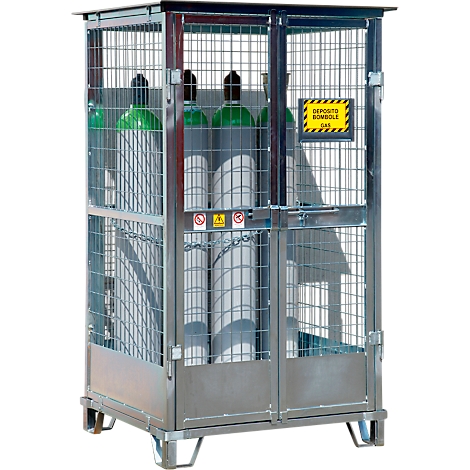Cage en treillis métallique contenant des bouteilles de gaz. Un panneau jaune met en garde contre le gaz. Des marques d'avertissement et de sécurité sont également visibles.
